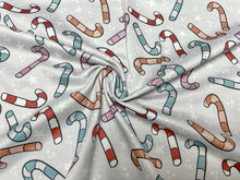 Load image into Gallery viewer, Brittany Frost Designs Candy Canes DBP Print #908 Double Brushed Polyester Spandex Apparel Stretch Fabric 190 GSM 58"-60" Wide By The Yard