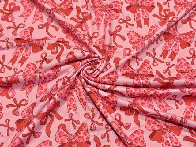Leopard Spot Bow DBP Print #1000 Double Brushed Polyester Spandex Apparel Stretch Fabric 190 GSM 58"-60" Wide By The Yard