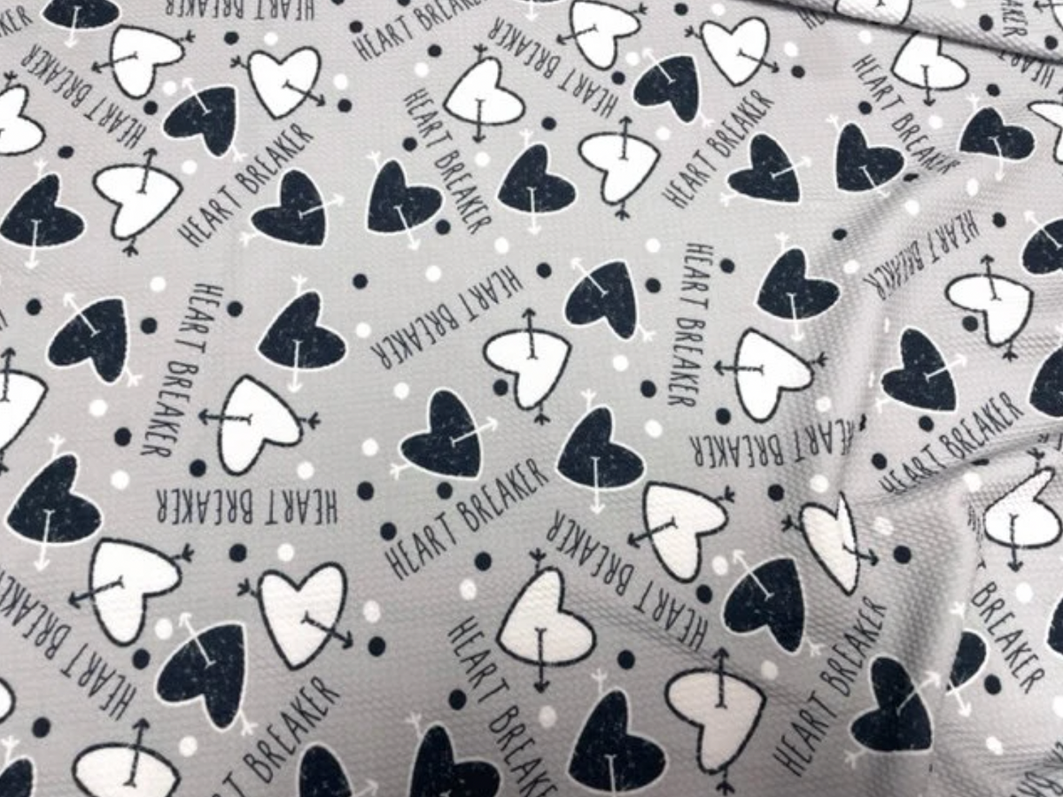 Brittany Frost Designs Heartbreaker Bullet Print #826 Ribbed Scuba Double Knit Stretch Poly Spandex Apparel Craft Fabric 58"-60" Wide BTY